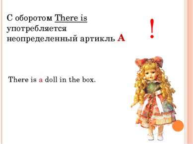 С оборотом There is употребляется неопределенный артикль ! There is a doll in...